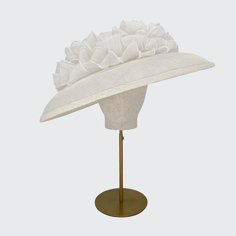 White fine straw bell with rolled organza bows