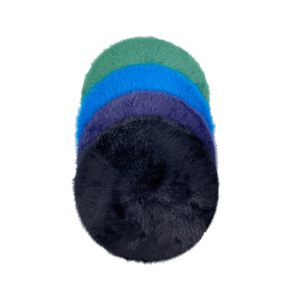 Photo of blue and green angora berets