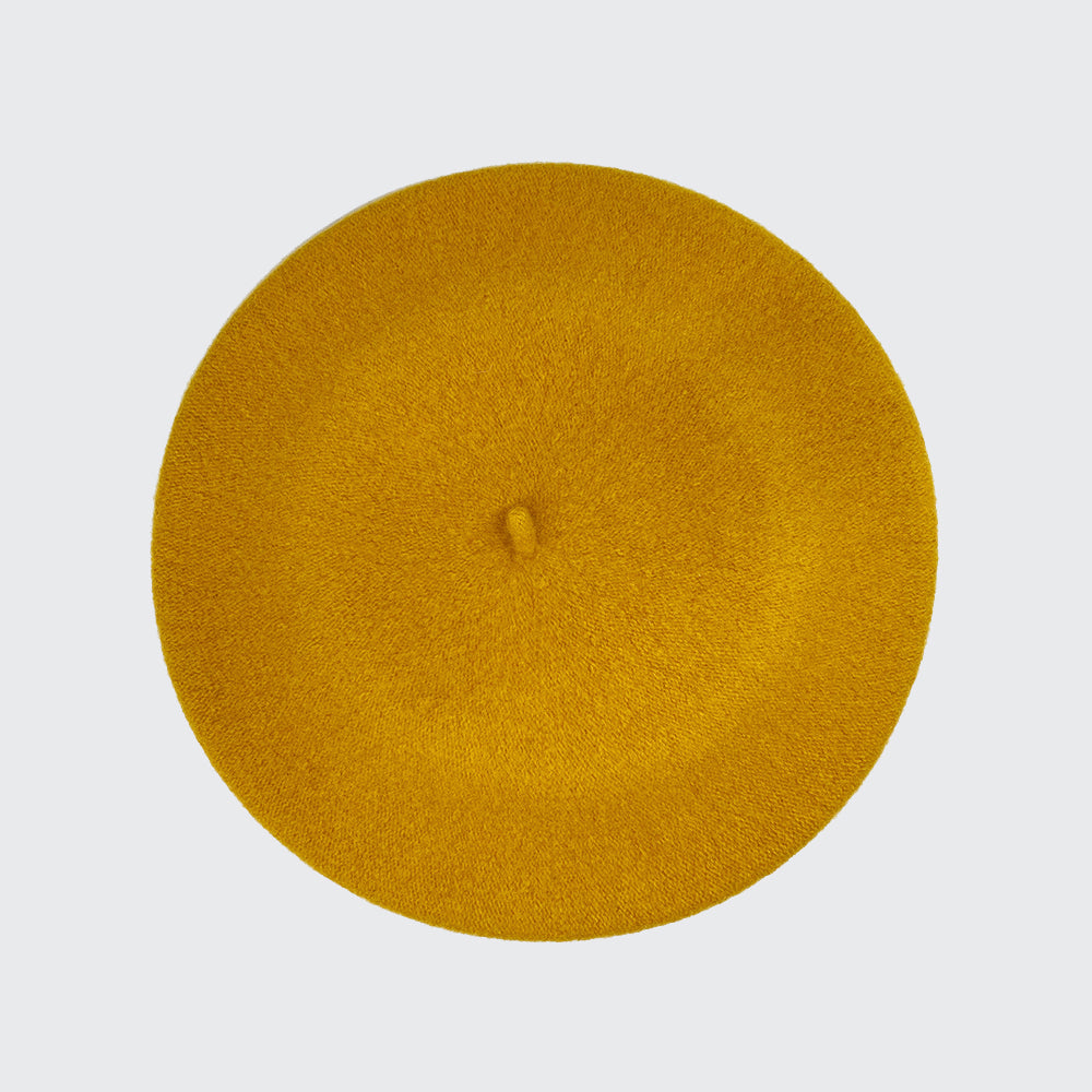 Photo of gold wool beret