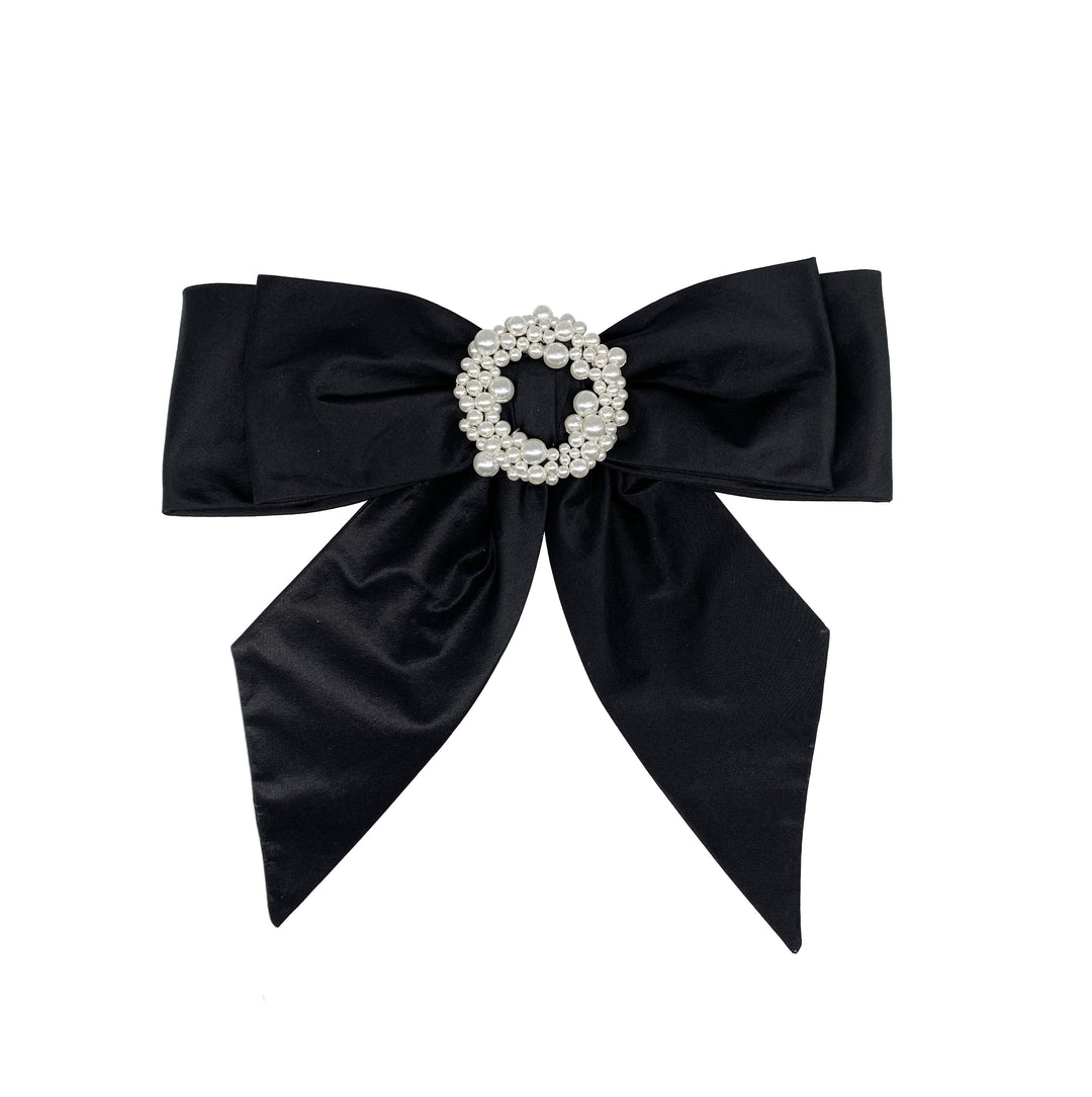 Black bow with pearl buckle