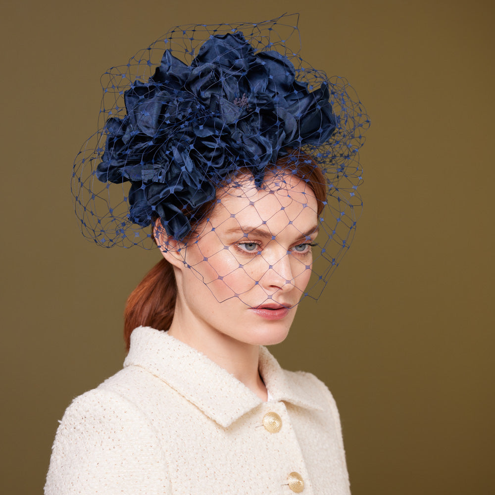 Navy silk flower headdress with veiling