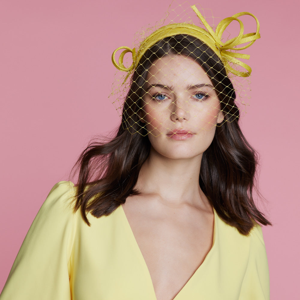 Yellow straw headband with veil and bows