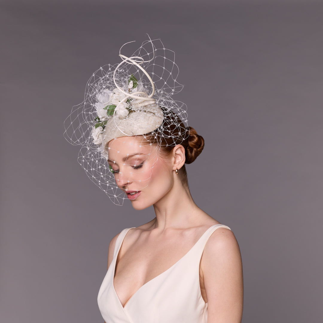 Ivory Serena crescent with silk flowers, veiling and quills