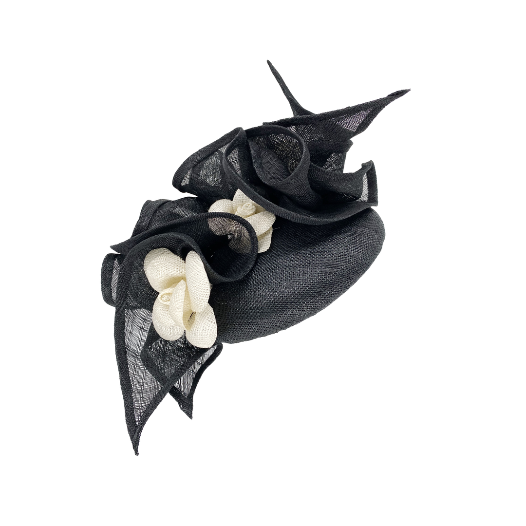 Black ruffle pillbox with ivory camellia