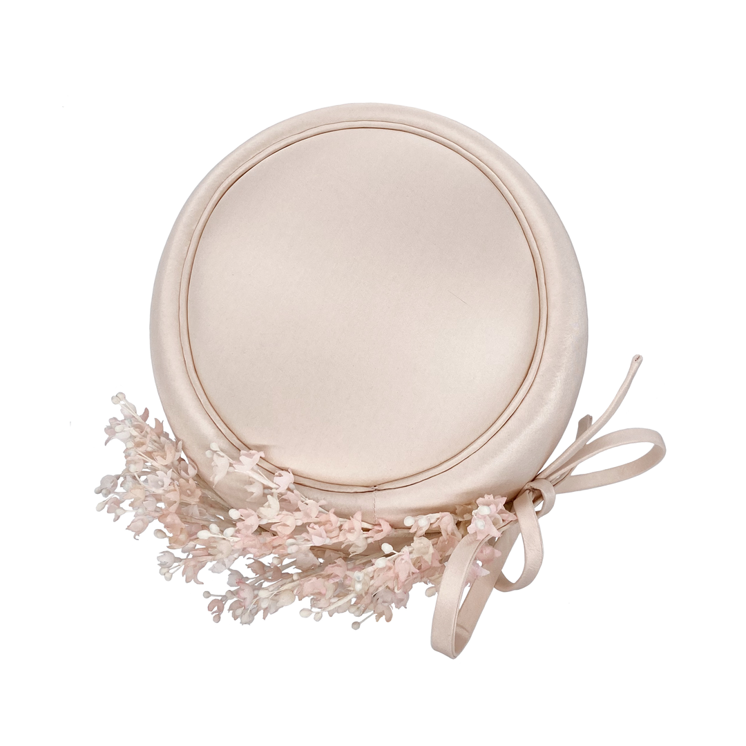 Nude pink silk Jackie O pillbox with Lily of the Valley spray