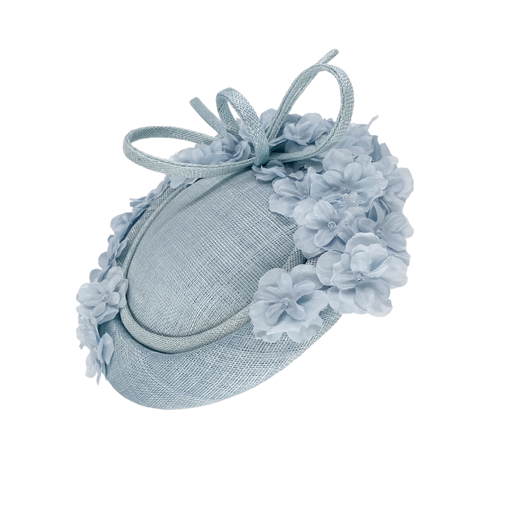 Pale blue button pillbox with delicate flowers