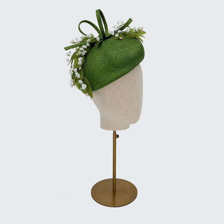 Green raised blocked beret with Lily of the Valley