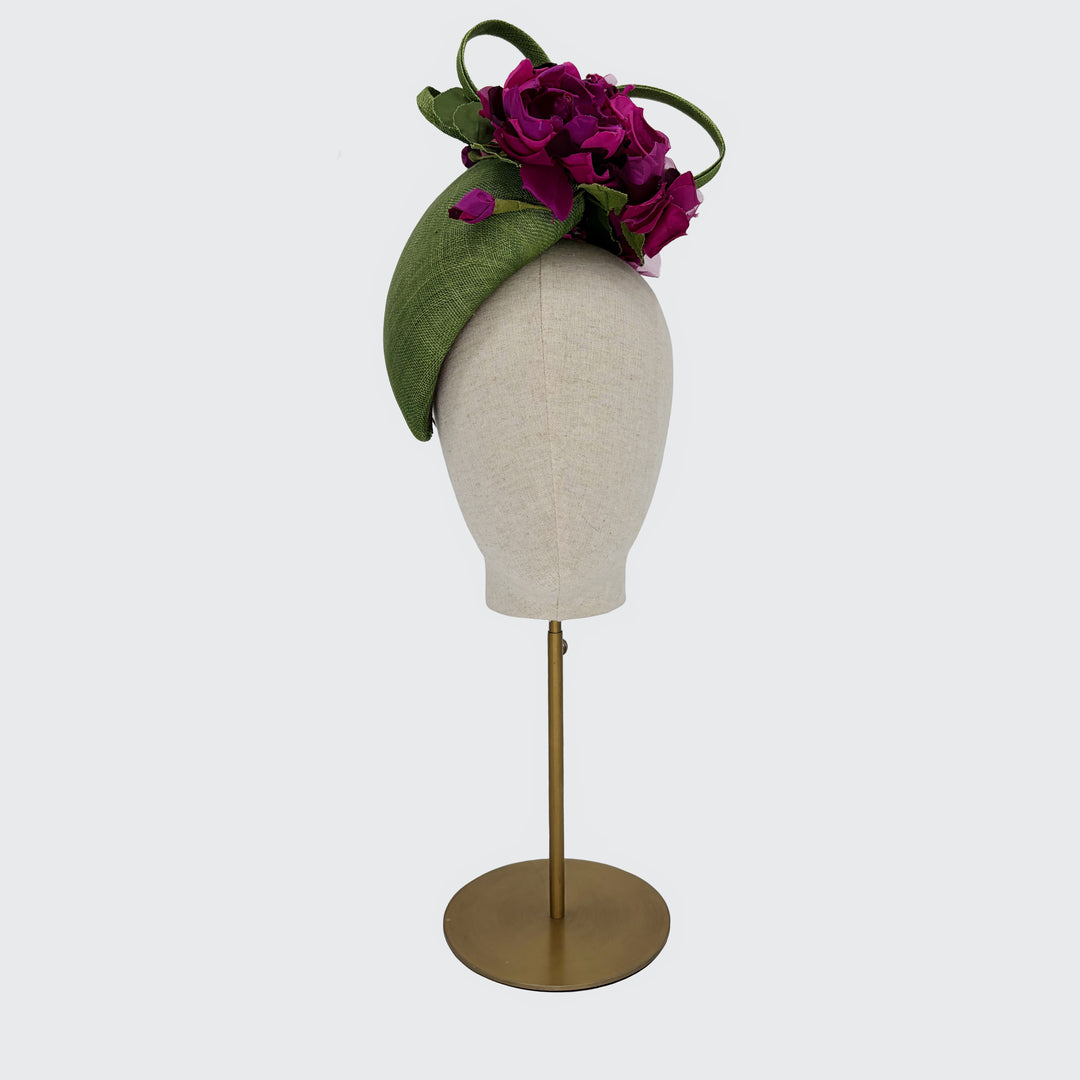 Green teardrop pillbox with deep pink silk flowers