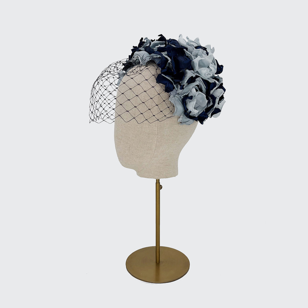 Navy and blue petal caplet and eye veil