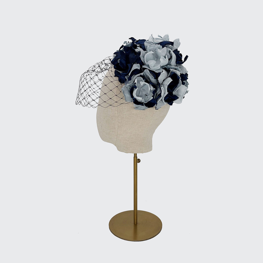 Navy and blue petal caplet and eye veil