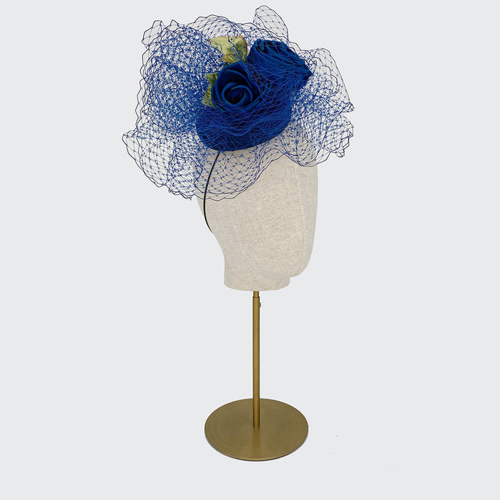 Blue silk mini pillbox with roses and veiling