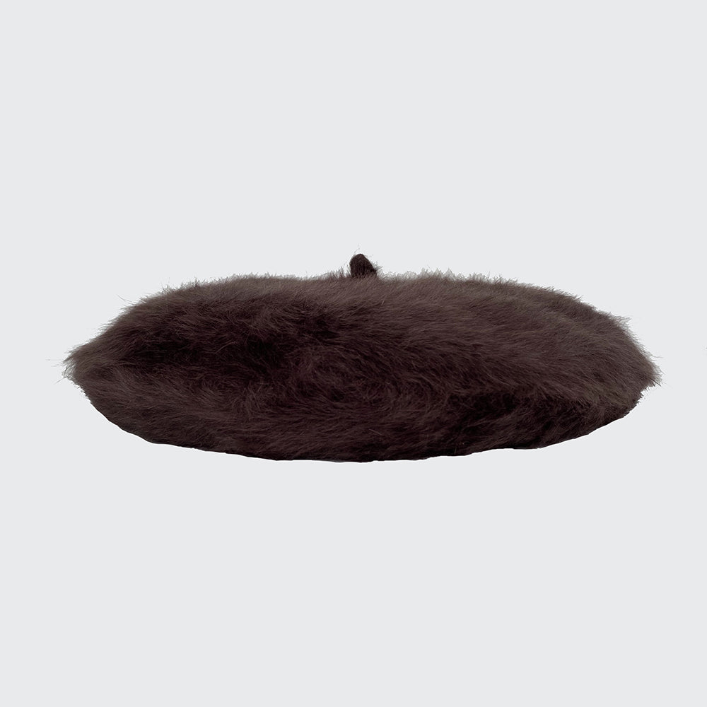 Side view of a chocolate angora beret
