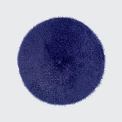 Photo of a dark blue angora beret