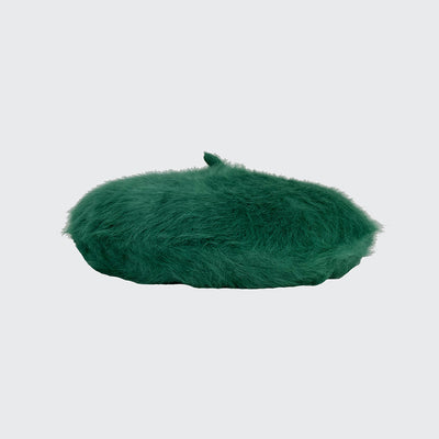 Side view of a emerald angora beret