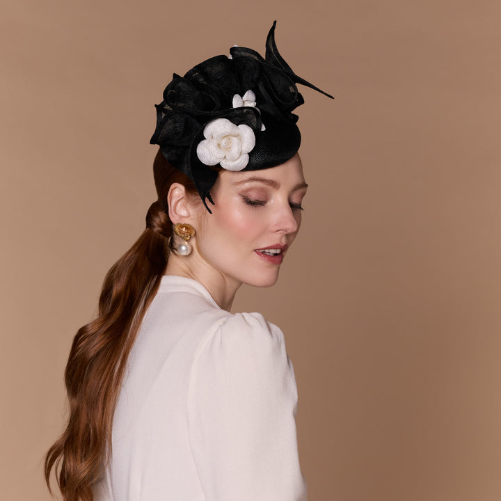 Black ruffle pillbox with ivory camellia