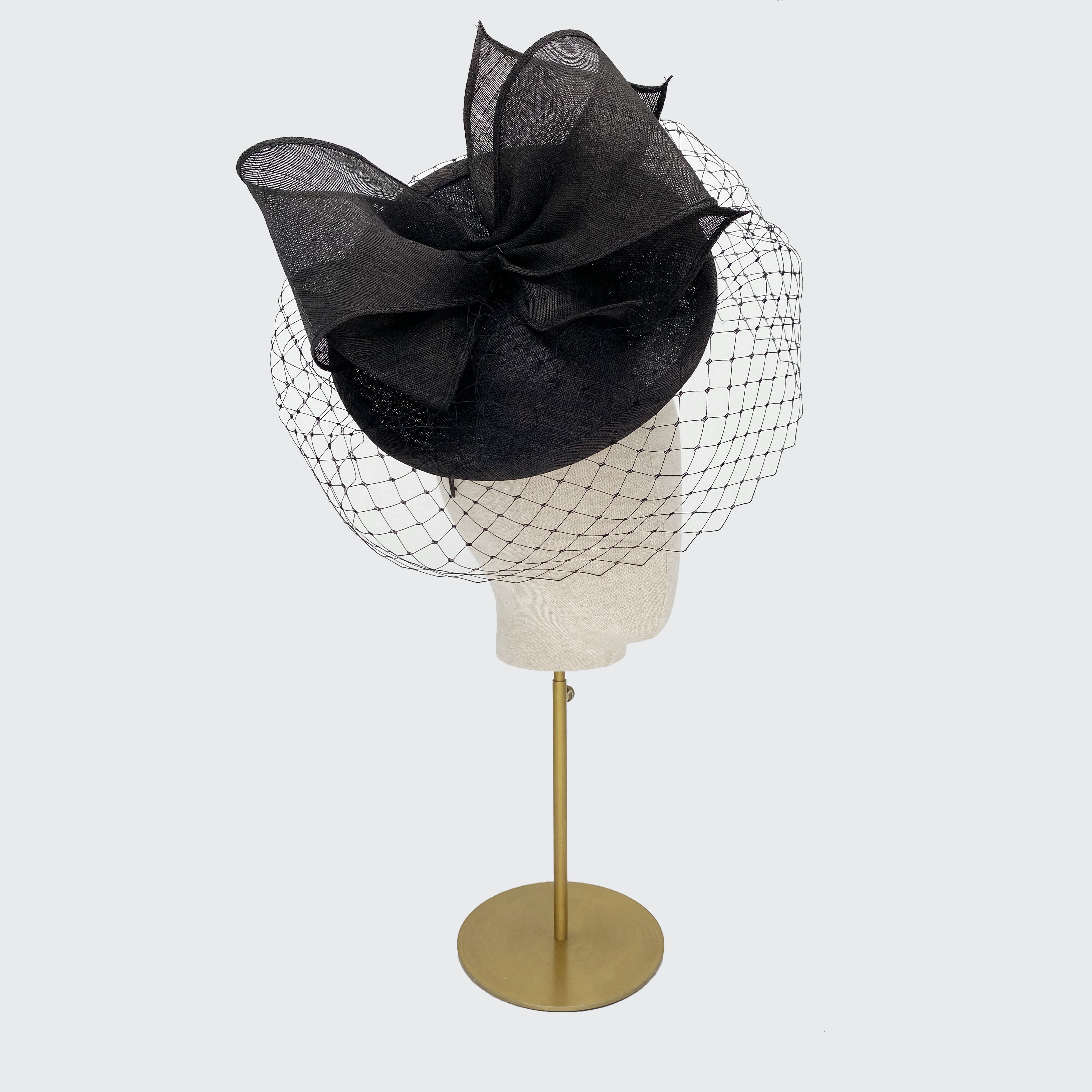 Black straw disc with large bow and veiling – Rachel Trevor-Morgan