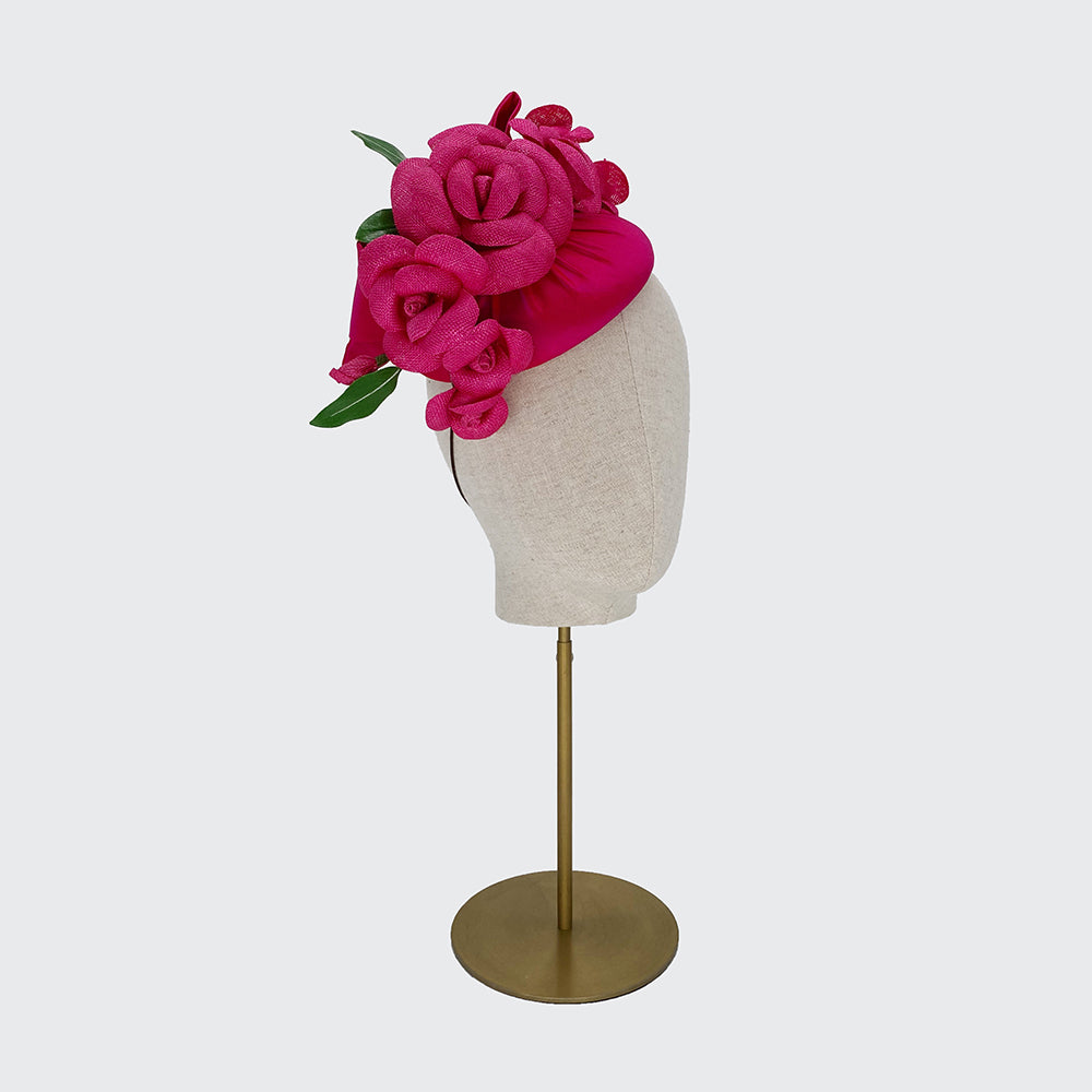 Deep pink silk pillbox with camellias