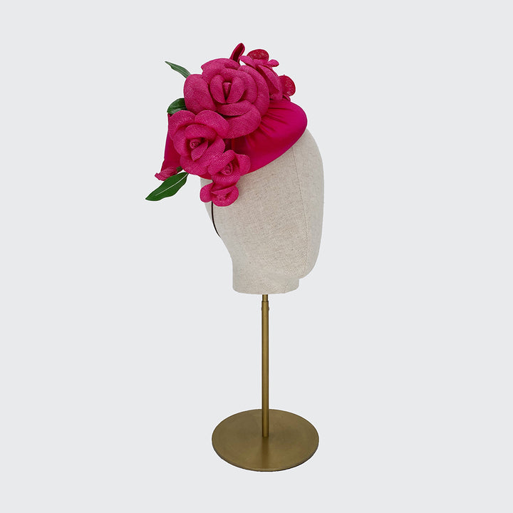 Deep pink silk pillbox with camellias