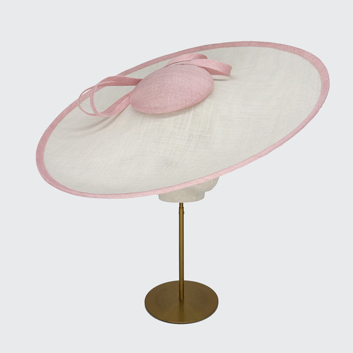 Large ivory and pale pink disc with bow