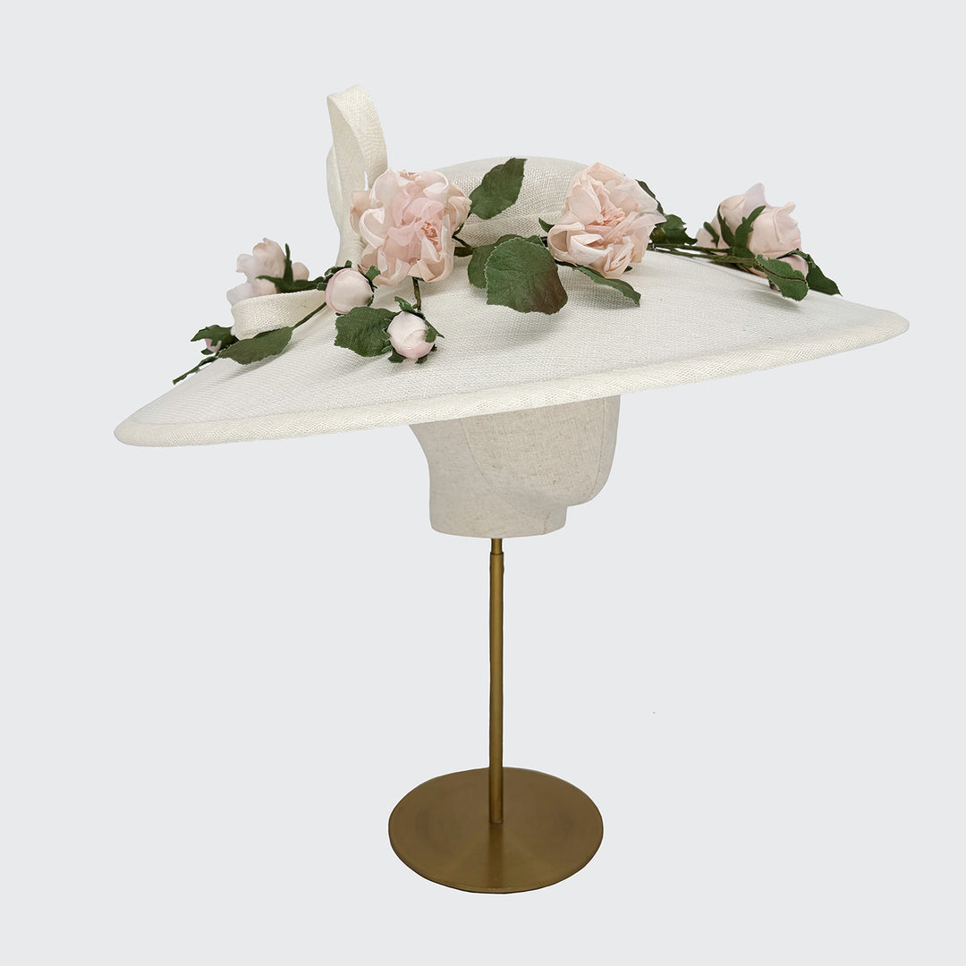 Ivory downbrim with trailing pink silk flowers