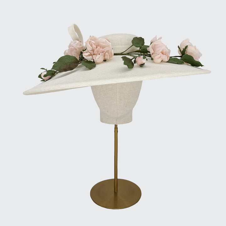 Ivory downbrim with trailing pink silk flowers