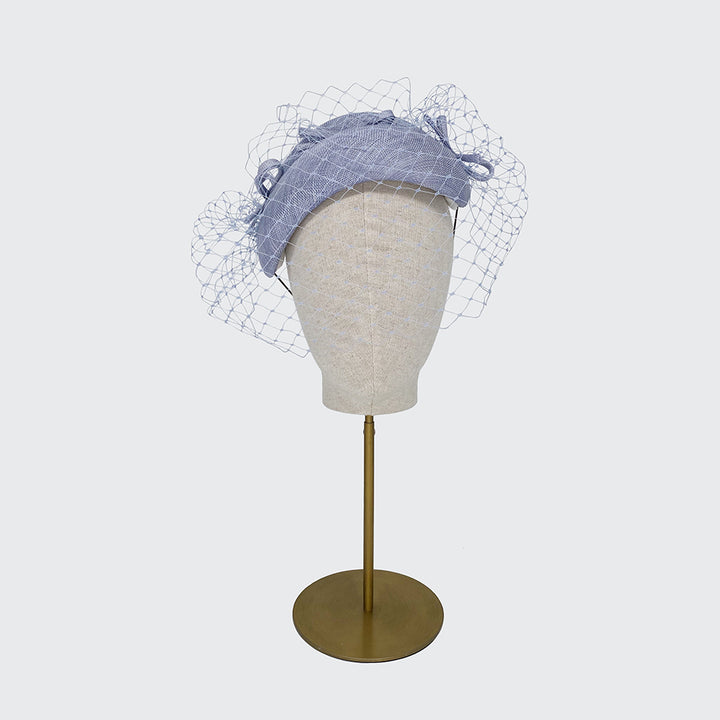 Pale blue Serena with veiling and mini bows