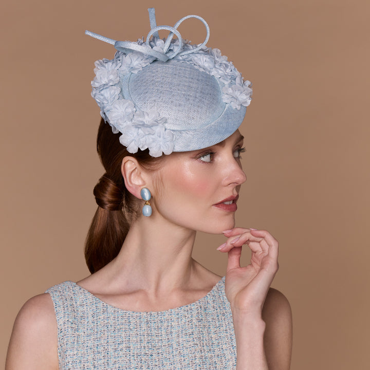 Pale blue button pillbox with delicate flowers