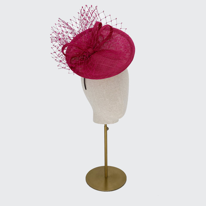 Deep pink mini disc with looped bow and veiling