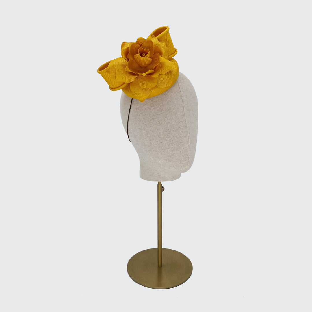 Yellow paribuntal straw pillbox with flower and bow