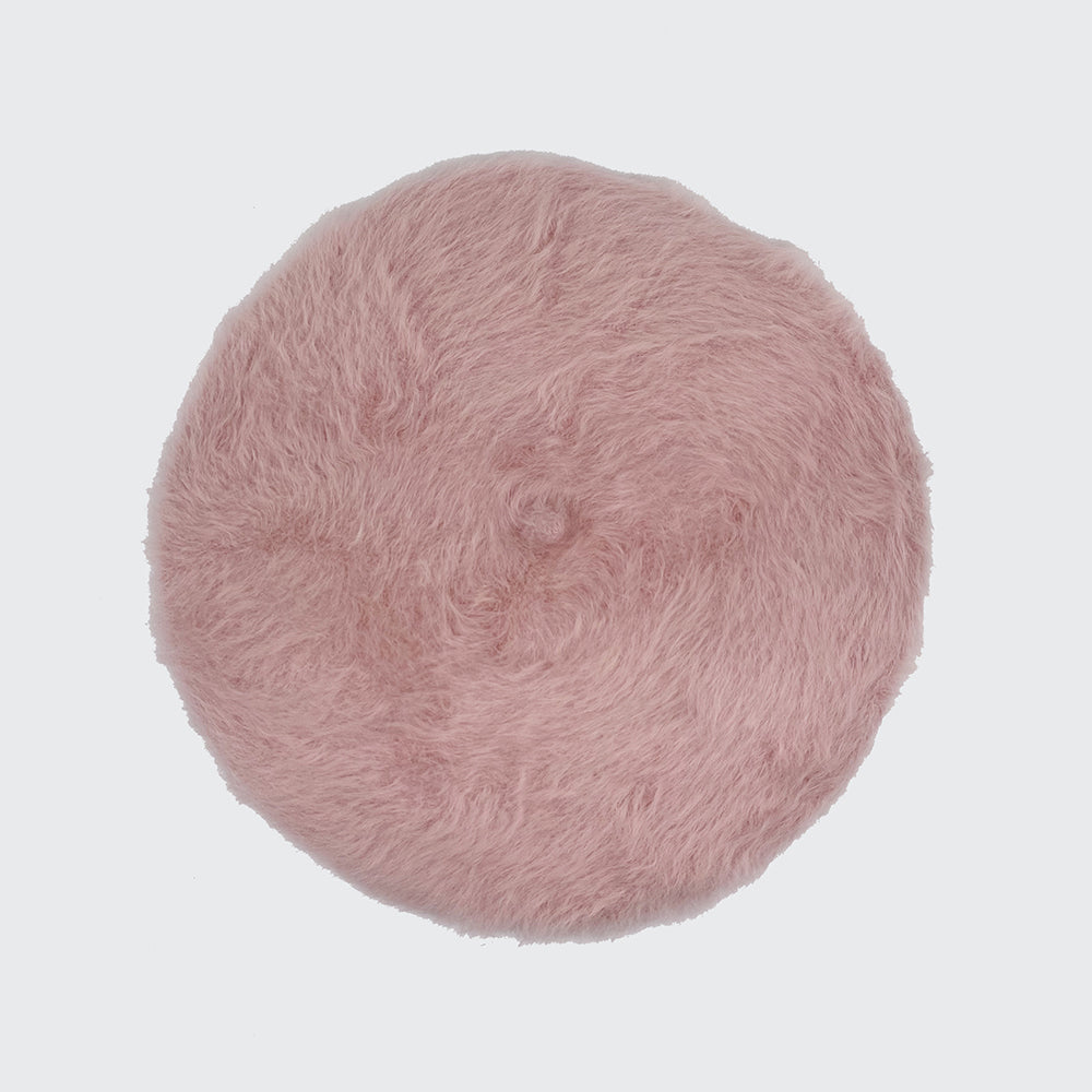 Photo of a pale pink angora beret