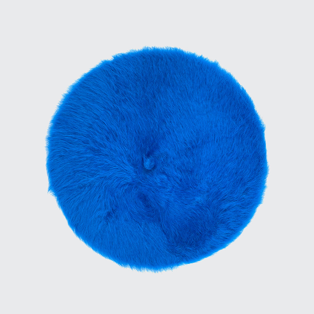 Photo of a royal blue angora beret