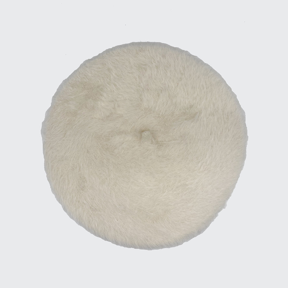 Photo of a white angora beret
