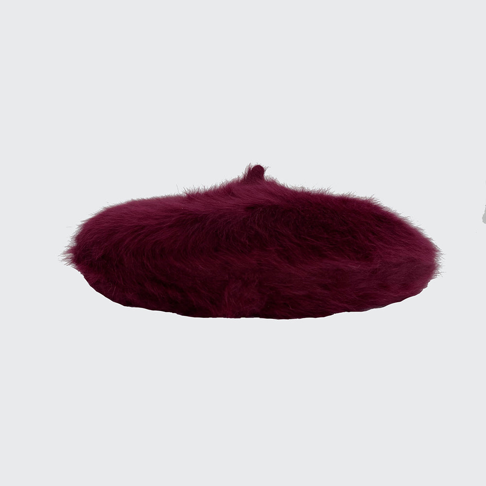 Side view of a wine angora beret