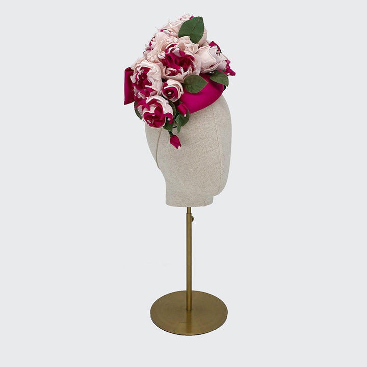 Deep pink pillbox with pale pink silk roses