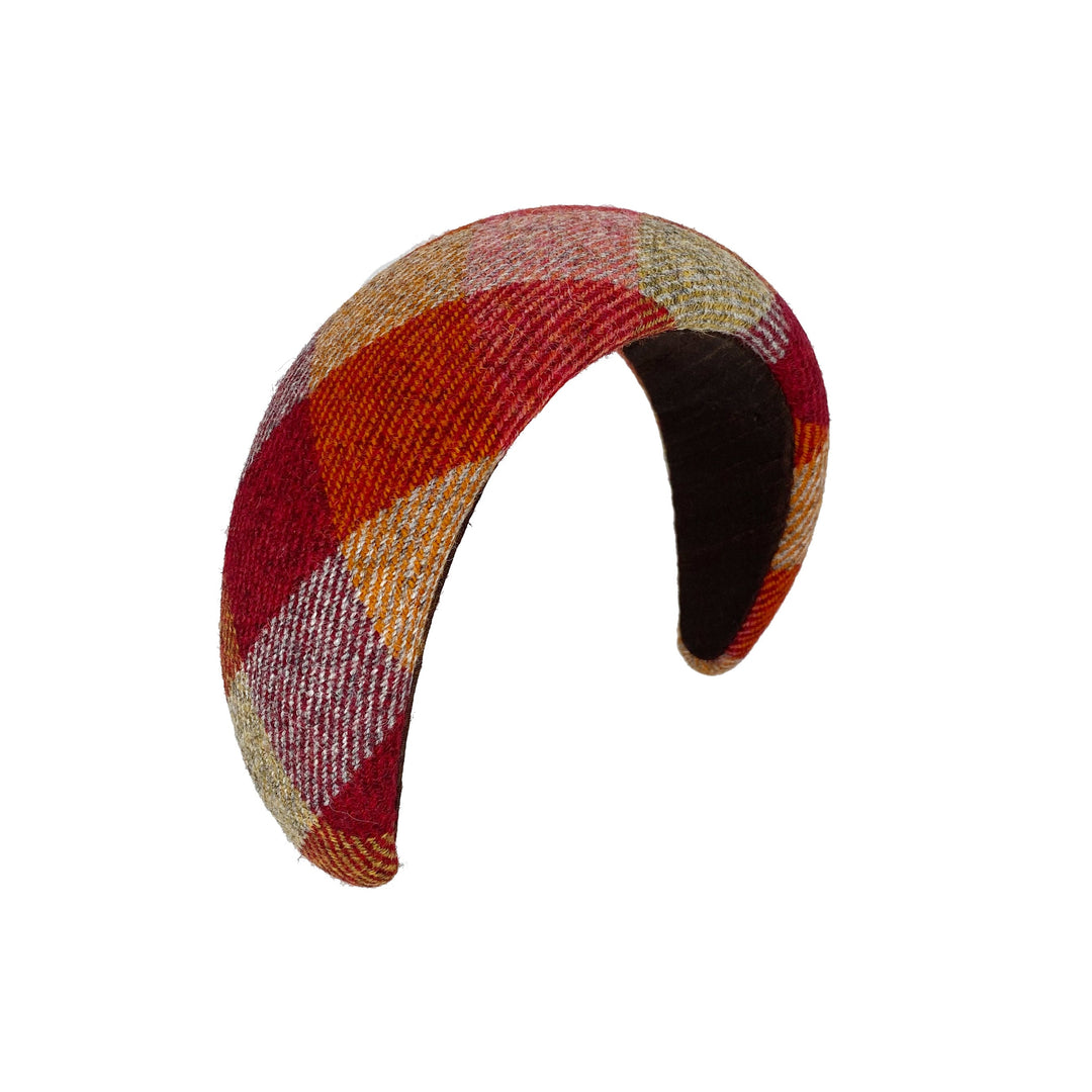 Plaid patterned headband on a white background