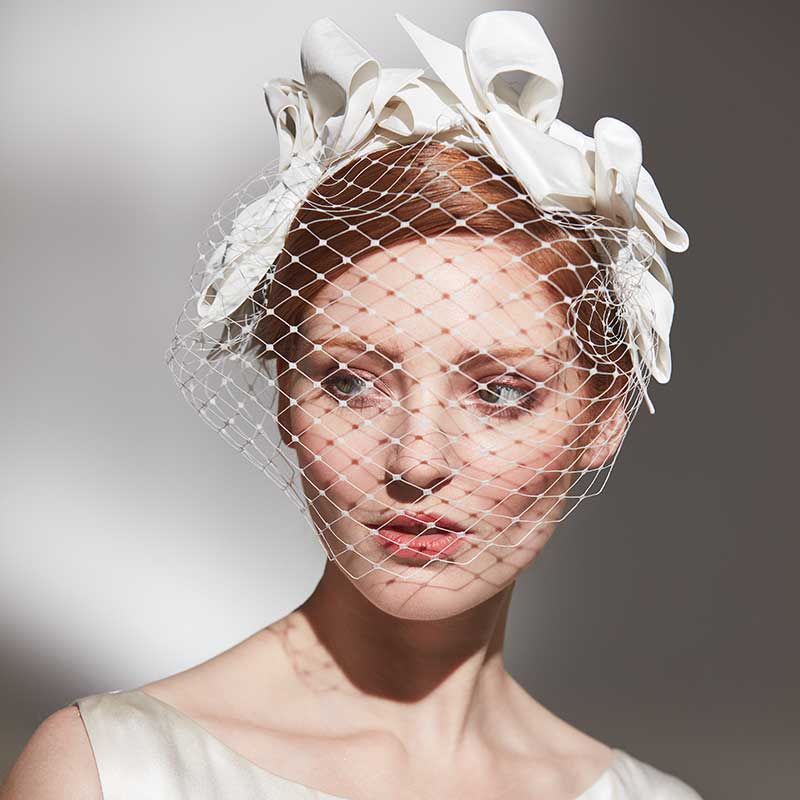 Bridal ivory bow headband with veil