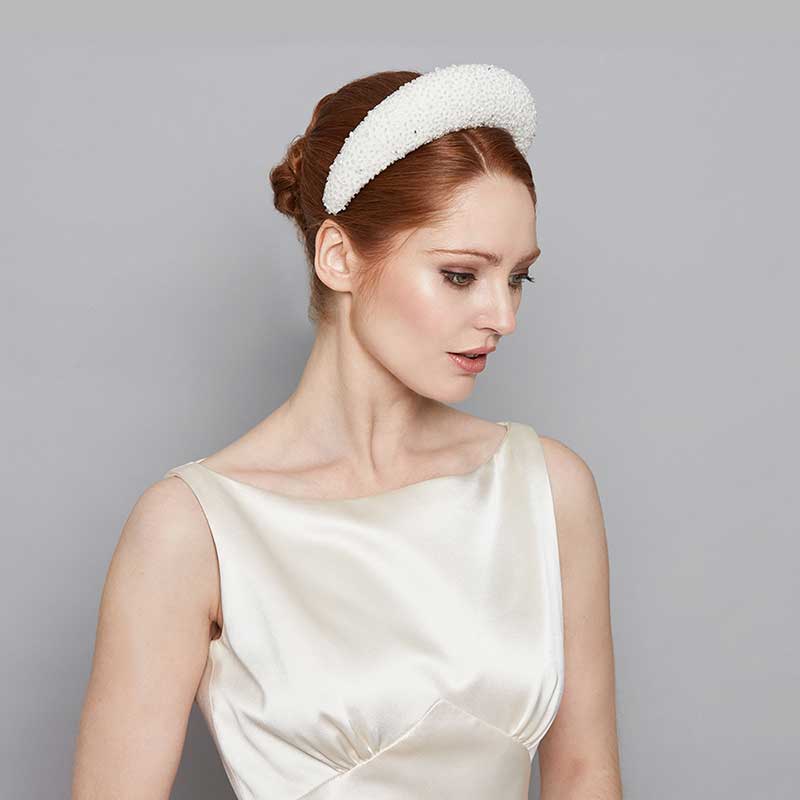 Bride wearing a raised silk beaded headband