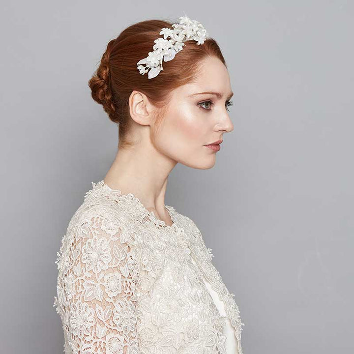 Bride wearing a waxed flower headband