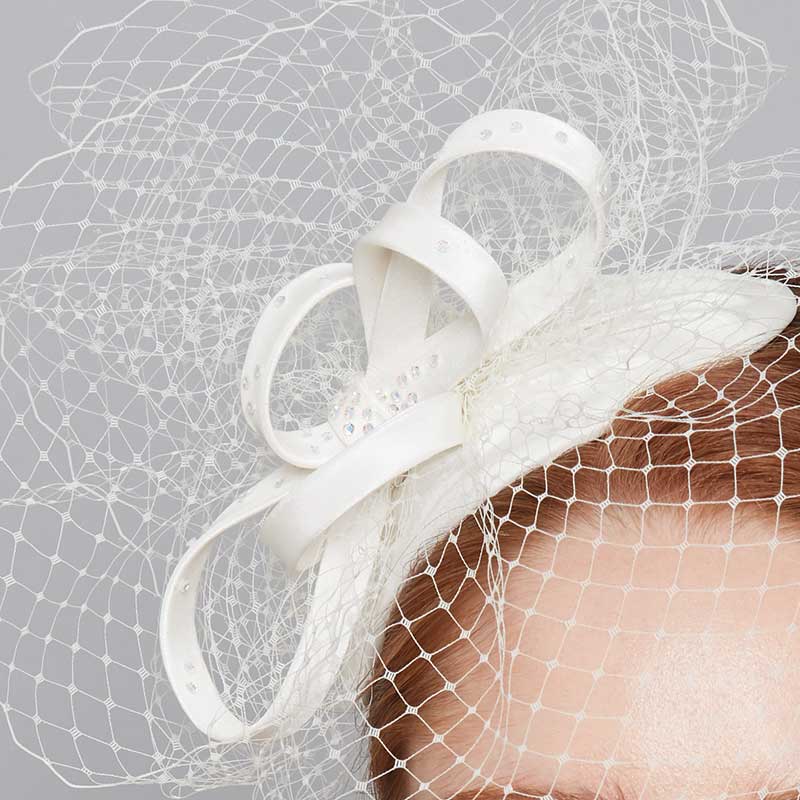 Close up of  a teardrop headband with beaded loops and birdcage