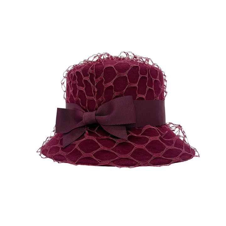 Photo of a burgundy bucket hat trimmed with veiling and a bow