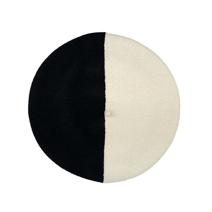Photo of black and white wool beret