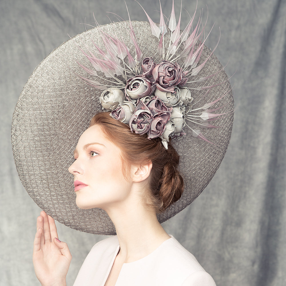 Grey mesh disc with dusty silk roses and feathers