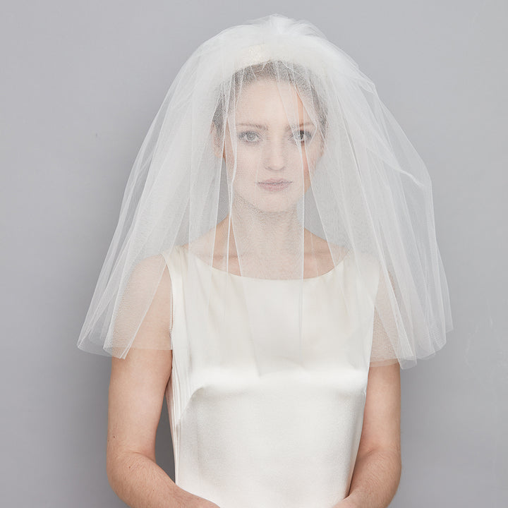 Ivory silk crescent with crystal beading with medium veil