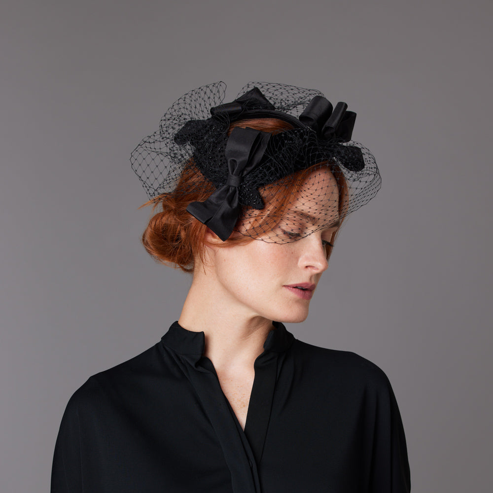 Triple crescent headpieces with bows and veiling