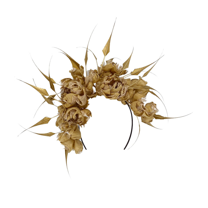 Photo of a brass gold silk headdress with diamond-cut feathers