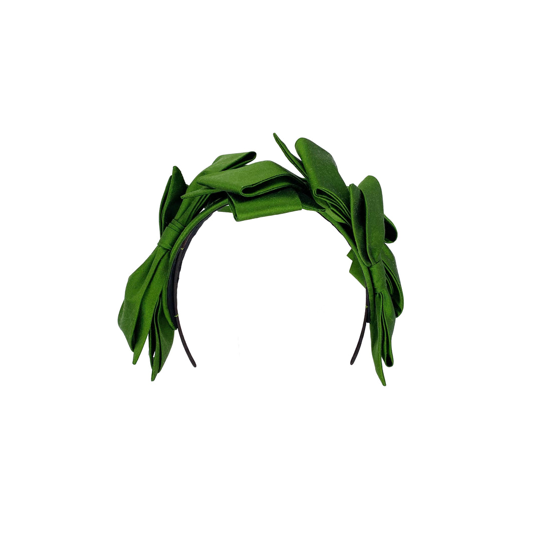 Photo of a green silk bow headband 