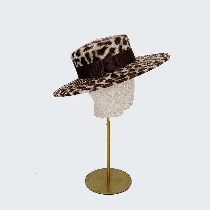 Photo of an animal print felt boater with a grosgrain band