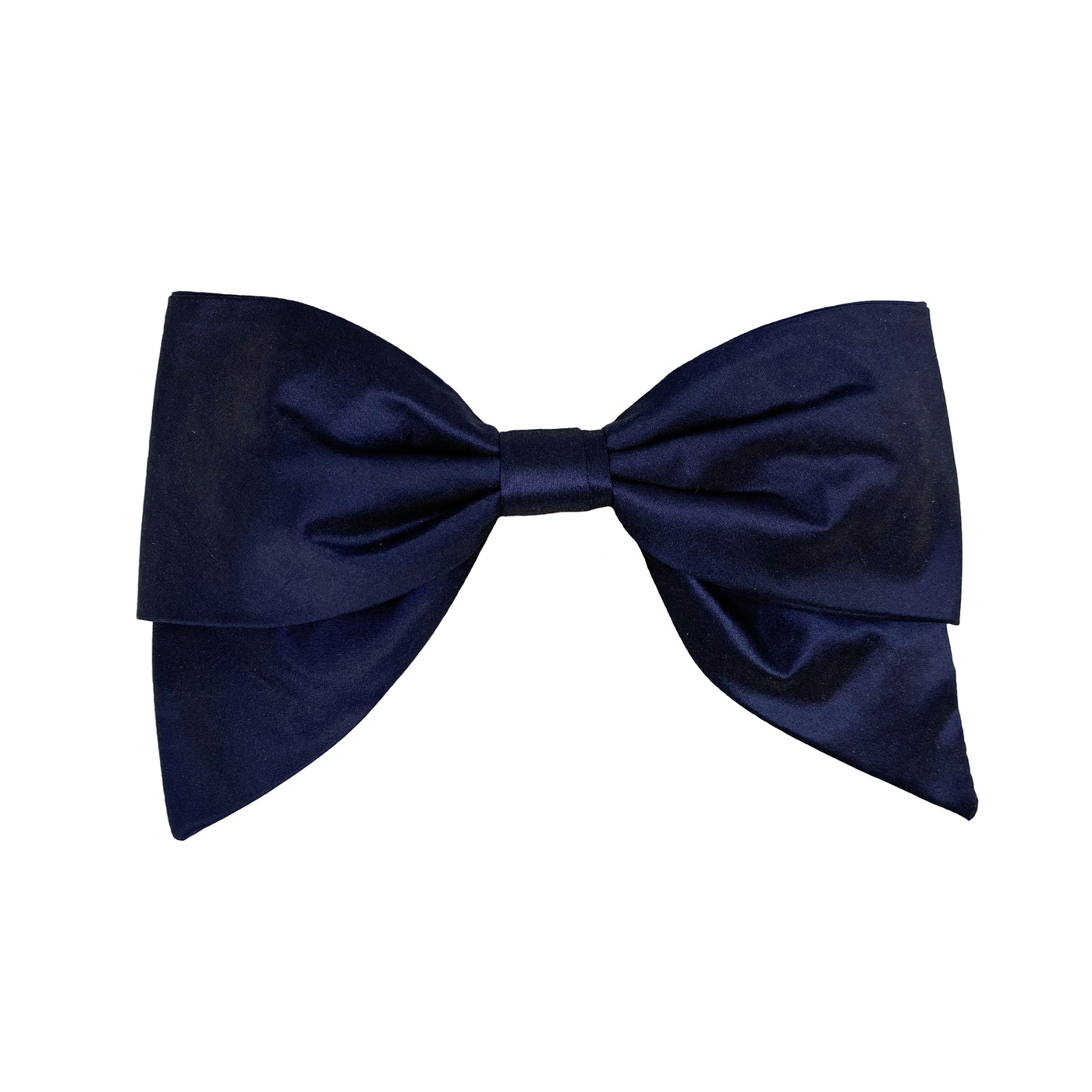 Photo a large navy blue silk bow clip